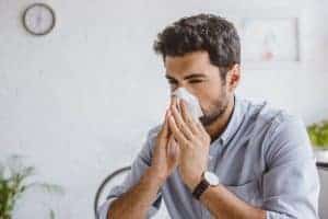 Sneezes spread diseases and is a common symptom of the common cold.