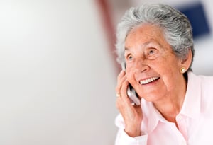 Portrait of a happy senior woman on the phone-1