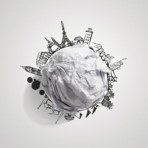 crumpled paper and traveling around the world as concept